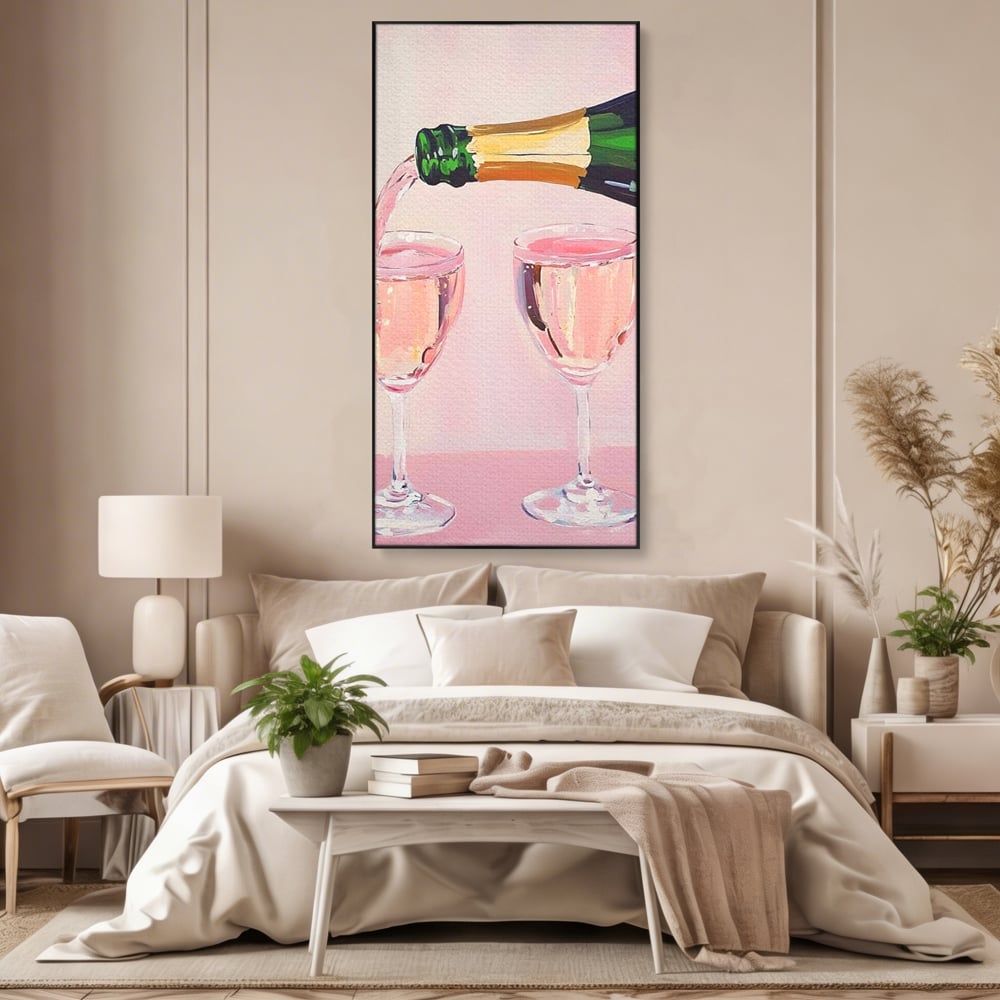 Tablou canvas cu pictura cu sticla si pahare de sampanie roz, in rama de aluminiu negru, pe perete intr-un dormitor